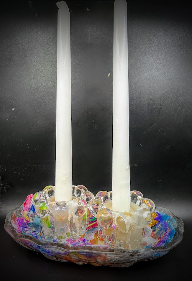 Candles in all shapes, scents, and sizes; candle holders & aromatherapy.