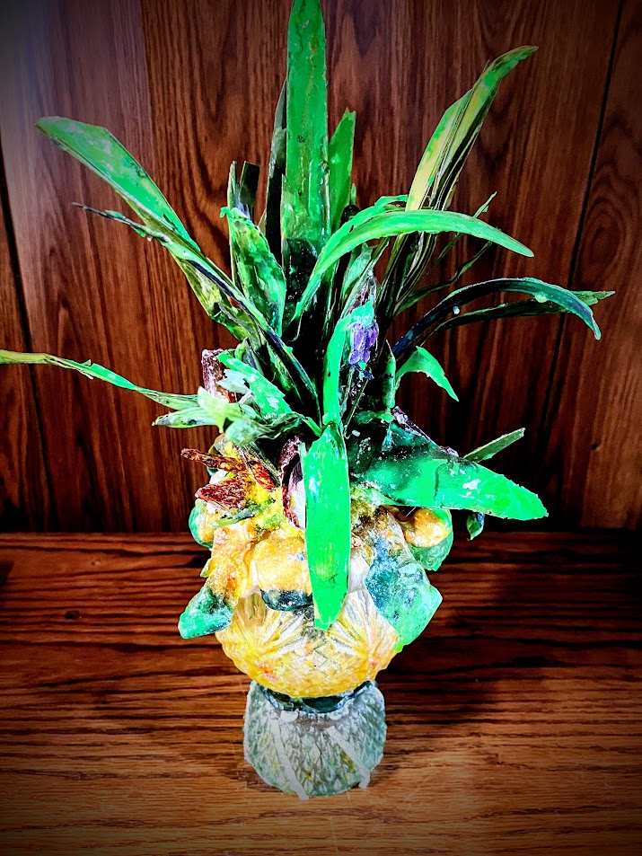 A resin/glass/mixed media sculpture, part of the "Luau: Collection."